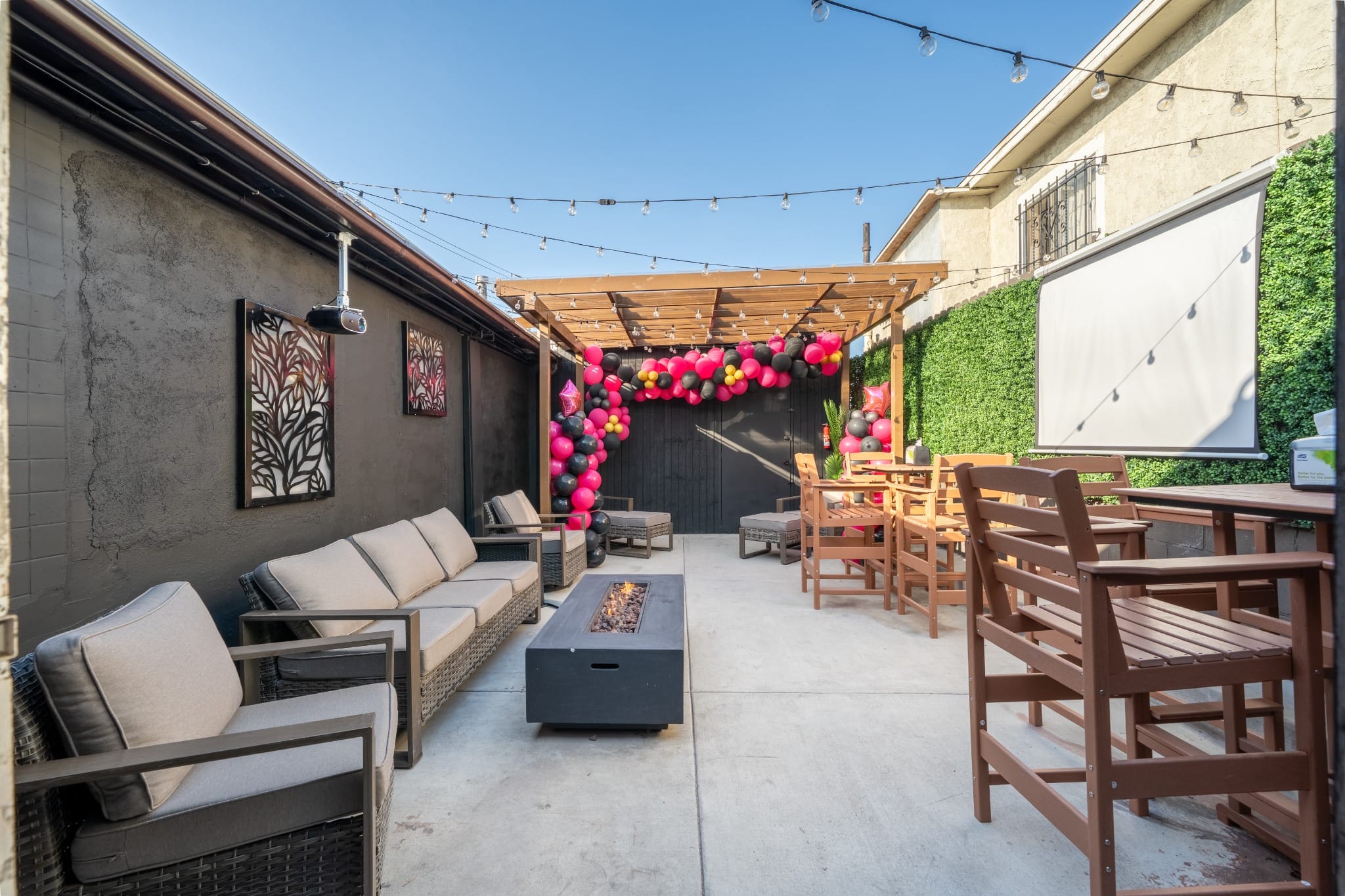 Patio lounge seating and balloon garland
